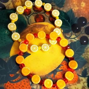 2 handmade polymer clay, lemon 🍋 & orange 🍊 girl's stretch beaded bracelets.